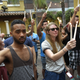 People hold candles during a vigil at the Ember restaurant and bar in Orlando, Fla., on June 12, 2016, for the victims of the Pulse club shooting in Orlando.
MANDEL NGAN/AFP/Getty Images